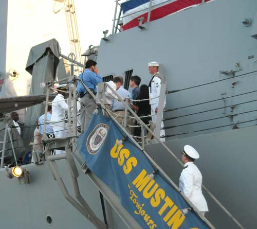 i'm calling my mom to say on board the uss mustin